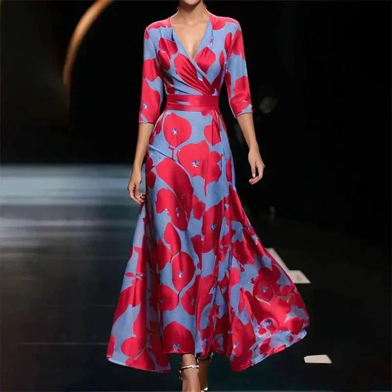 Robe longue femme en tissu léger, col V, imprimé floral coloré et ceinture assortie pour un ajustement flatteur.