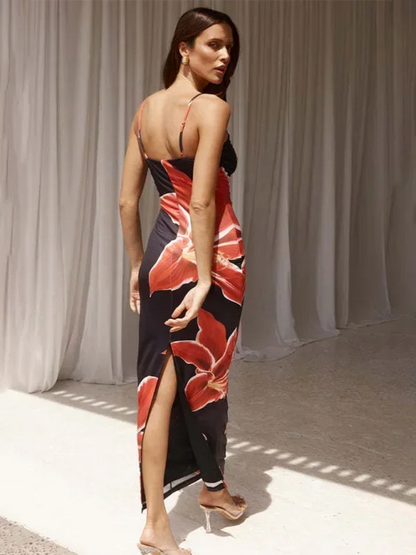 Robe longue à fines bretelles, en coton léger, avec un imprimé floral coloré et une coupe fluide pour un confort quotidien.