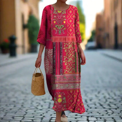 Robe longue femme en coton léger, imprimée avec un motif ethnique, manches 3/4 et couleur rose douce.