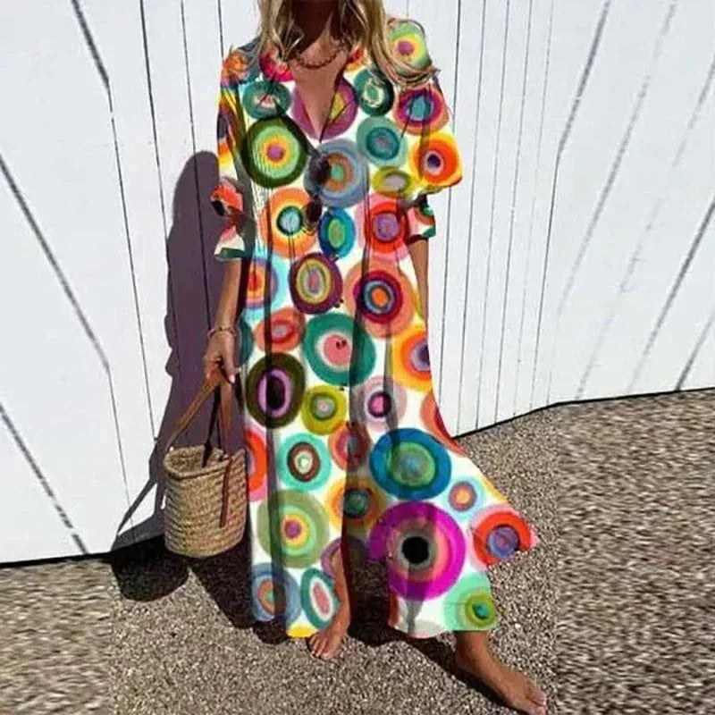 Robe longue femme à imprimé floral, col V, manches mi-longues en tissu léger, offrant confort et style décontracté.