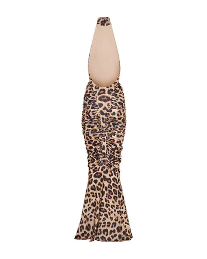 Robe longue femme à imprimé léopard, dos nu, en tissu léger, idéale pour les journées d'été et les sorties décontractées.