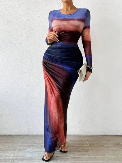 Robe longue bleue femme à manches longues, en tissu léger avec un motif unique et élégant, parfaite pour les occasions…