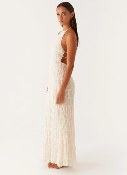 Robe longue noire à bretelles, en coton léger, coupe fluide, parfaite pour les journées d'été.