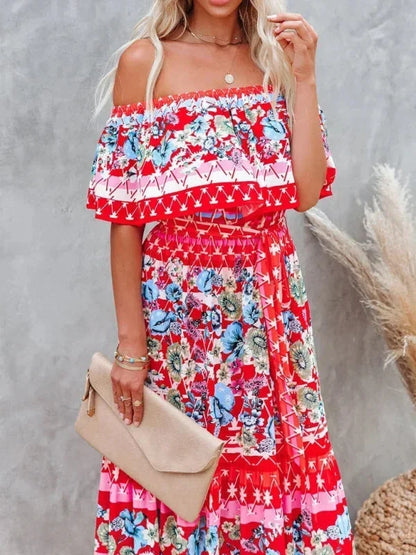 Robe longue femme à épaules dénudées, en tissu léger avec motifs floraux élégants et coupe fluide.