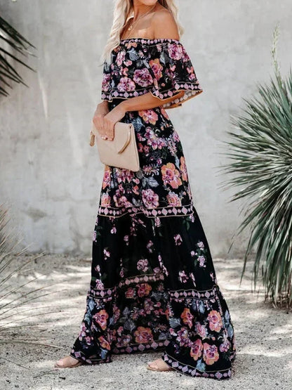 Robe longue femme à épaules dénudées, en coton léger, avec motifs floraux colorés et design fluide pour un look décontracté.