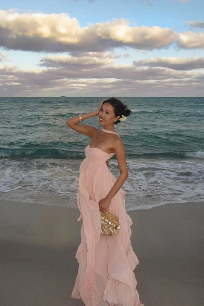 Robe longue femme rose en coton léger, avec des volants à la taille et des manches détachables pour un style fluide et…