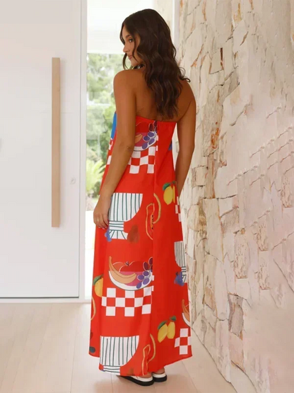 Robe longue sans bretelles en tissu léger, motifs estivaux colorés, parfaite pour les journées d'été.