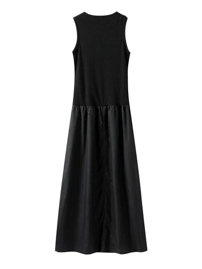 Robe longue femme sans manches en polyester, avec jupe évasée, couleur noir, parfaite pour les occasions estivales.