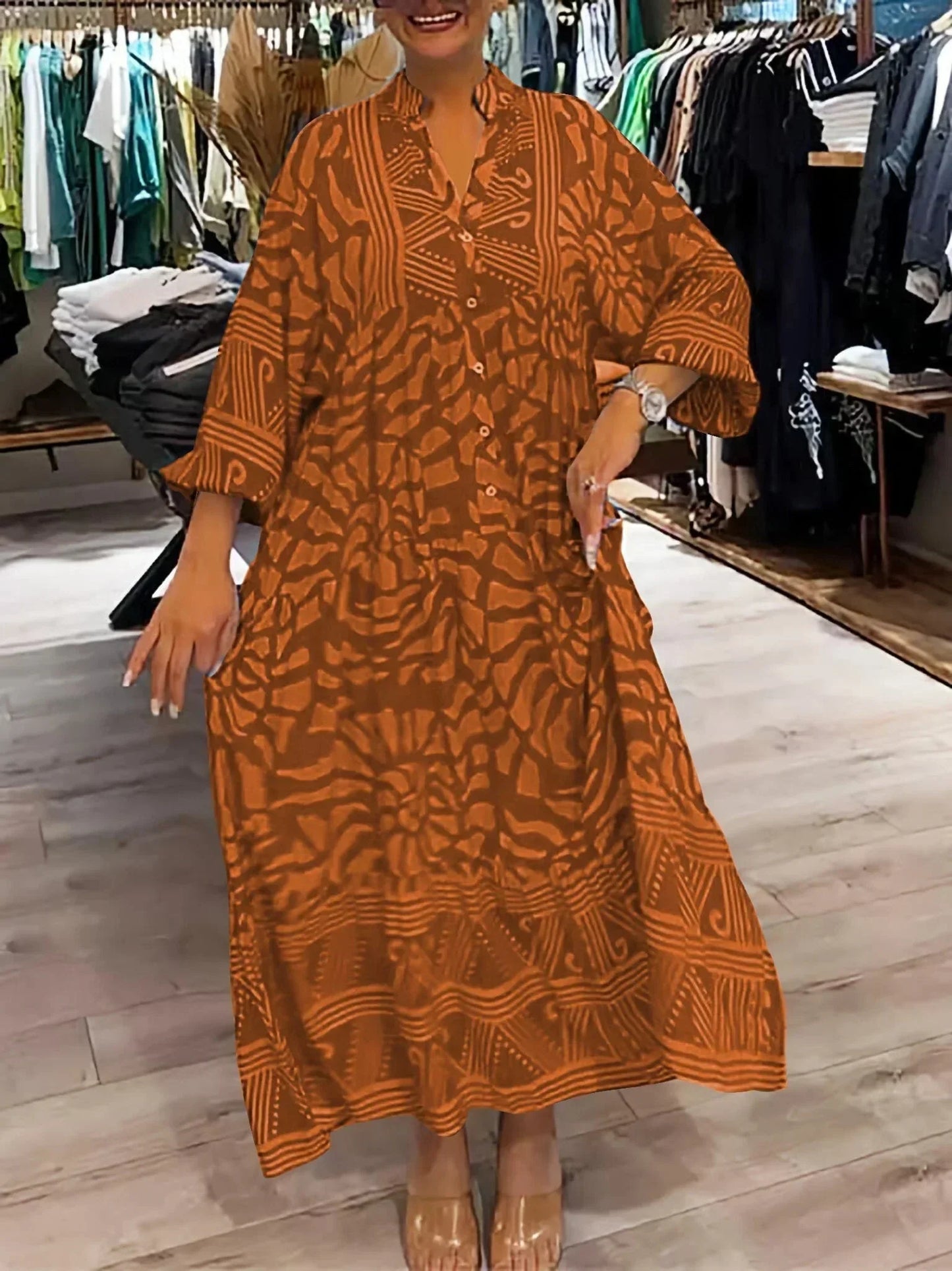 Robe longue orange fluide à manches longues, col en V, imprimée avec un tissu léger et agréable pour les journées…