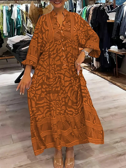 Robe longue orange fluide à manches longues, col en V, imprimée avec un tissu léger et agréable pour les journées…