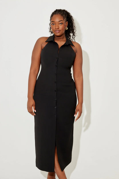 Robe longue sans manches avec col en V, en tissu léger, parfaite pour les journées chaudes et les occasions décontractées.