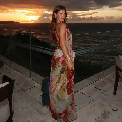 Robe longue sans manches à fleurs multicolores, fente élégante, col en V, idéale pour les journées d'été.