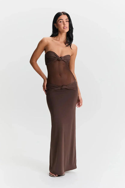 Robe longue bustier longue en tissu léger avec effet transparent et nœud, idéale pour l'été et les occasions spéciales.