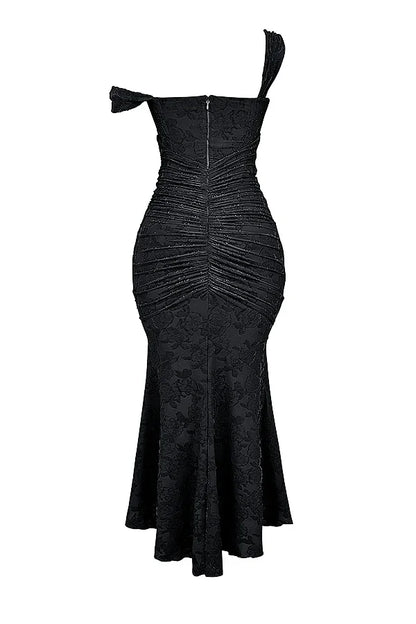 Robe maxi femme en coton léger, motif floral coloré, avec bretelles larges pour un confort optimal et une coupe fluide.