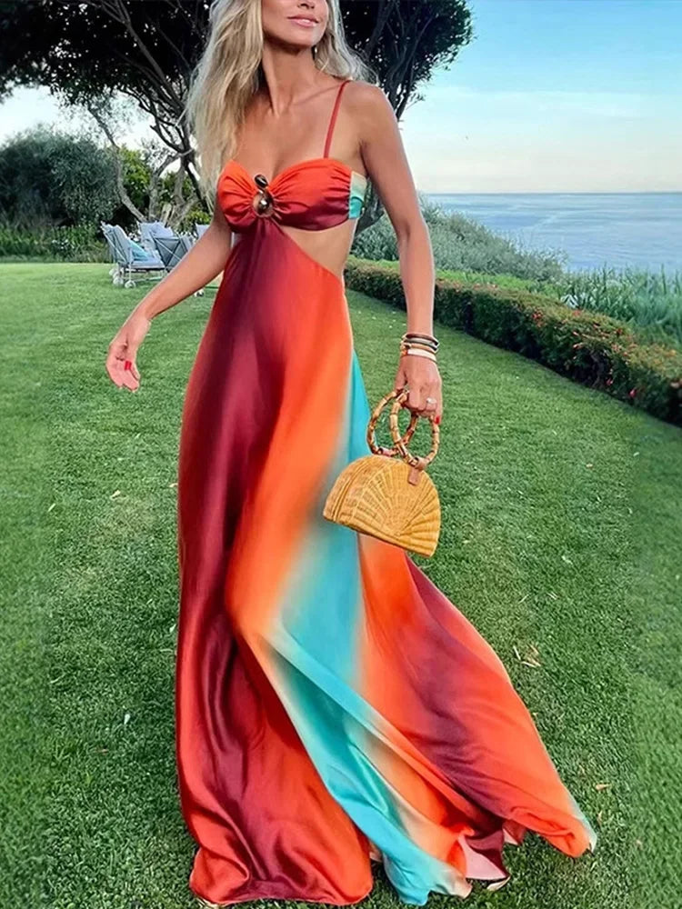 Robe maxi femme en viscose, dégradé orange et turquoise avec découpes stylées et fluide, idéale pour les journées d'été.
