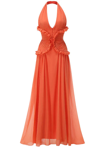 Robe maxi femme orange en tissu léger, avec volants fluides et coupe évasée, parfaite pour les journées ensoleillées.