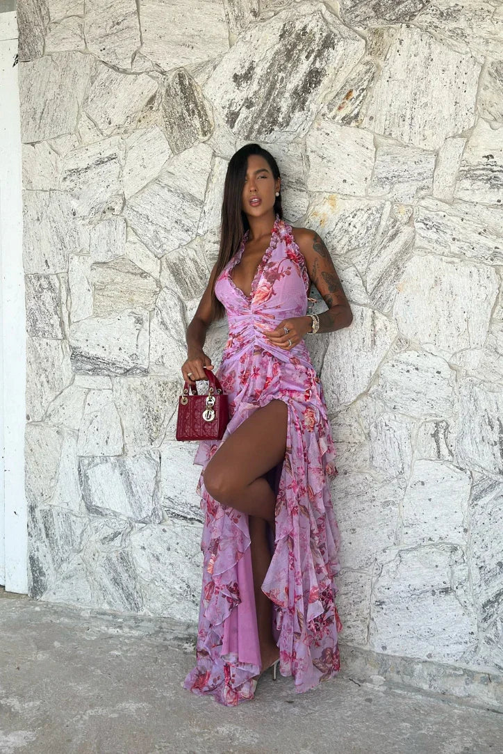 Robe maxi femme violette avec un imprimé floral, manches volantées et tissu léger pour un confort estival.