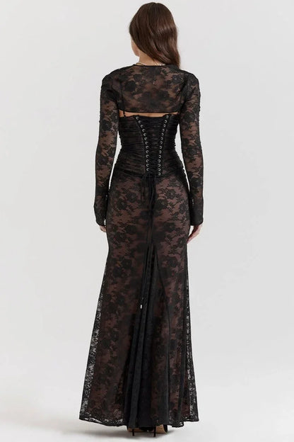 Robe longue à fleurs avec dentelle, manches longues et détails sur les épaules, idéale pour les cérémonies et les soirées.