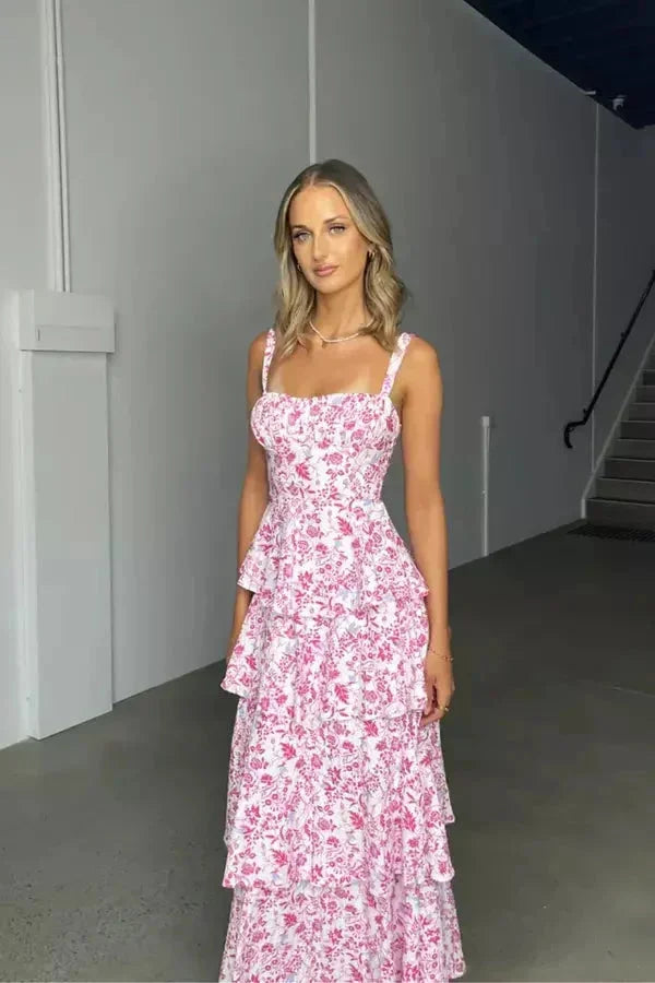 Robe longue florale à volants, bretelles fines, nœud dans le dos, en coton léger, idéal pour l'été.