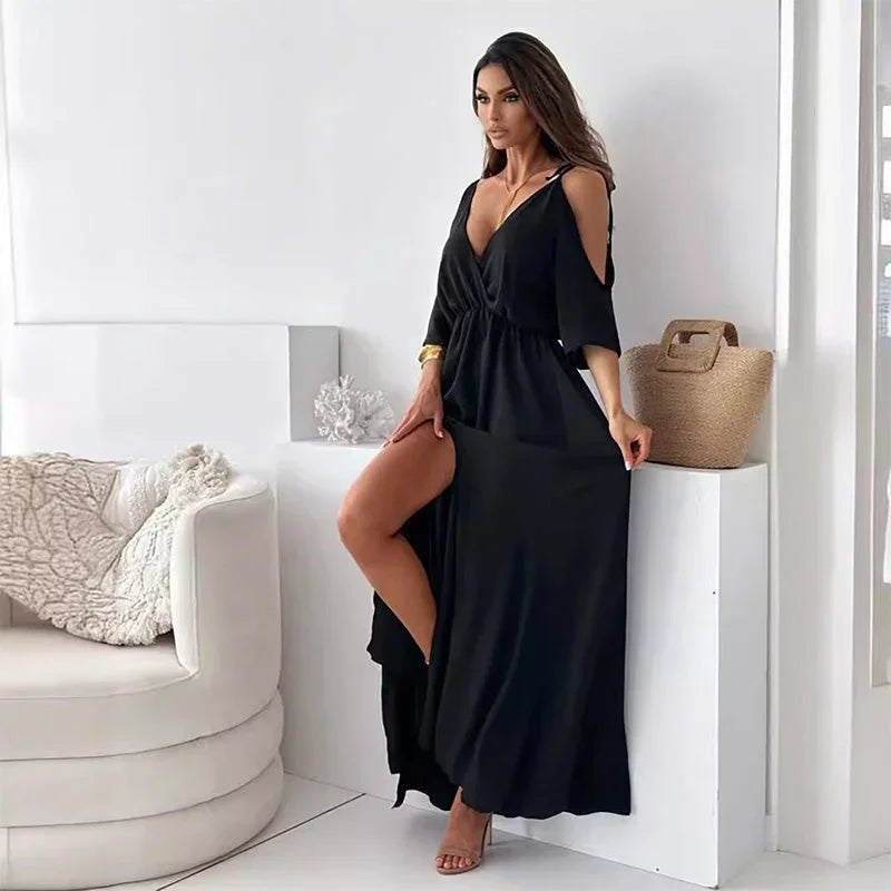 Robe longue sans manches en tissu léger, col en V, fente latérale et bretelles ajustables pour un style décontracté.
