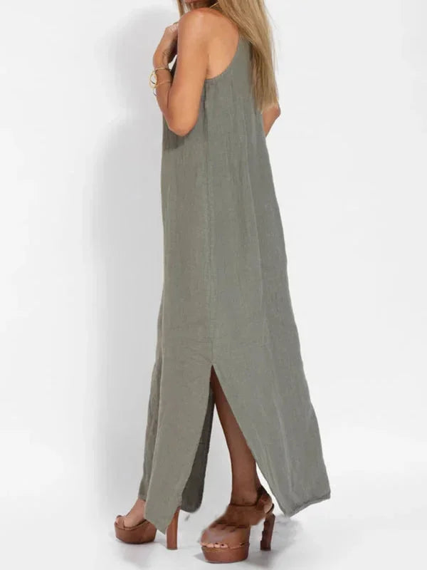 Robe longue sans manches en tissu léger, coupe fluide, parfaite pour un look décontracté en été.