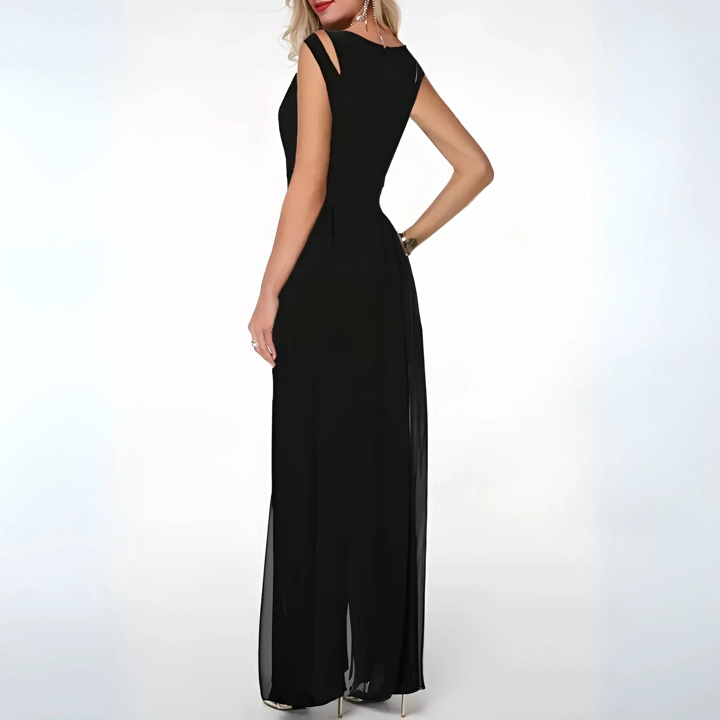 Robe longue sans manches avec découpes latérales, réalisée en tissu fluide pour un confort et un style élégant.