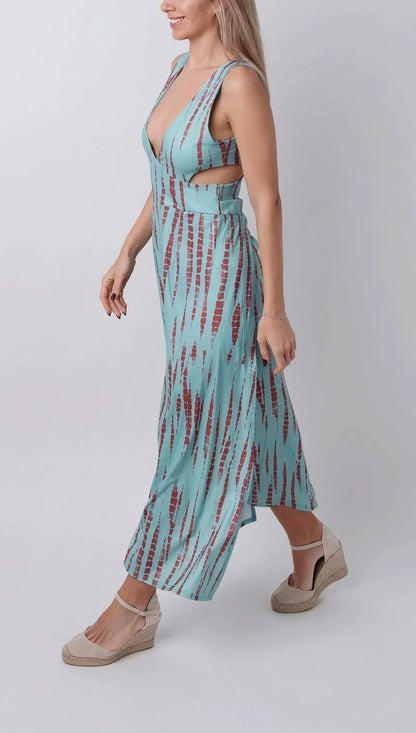 Robe longue fendue en tissu léger, tie-dye avec découpe et col plongeant, parfaite pour les journées d’été.