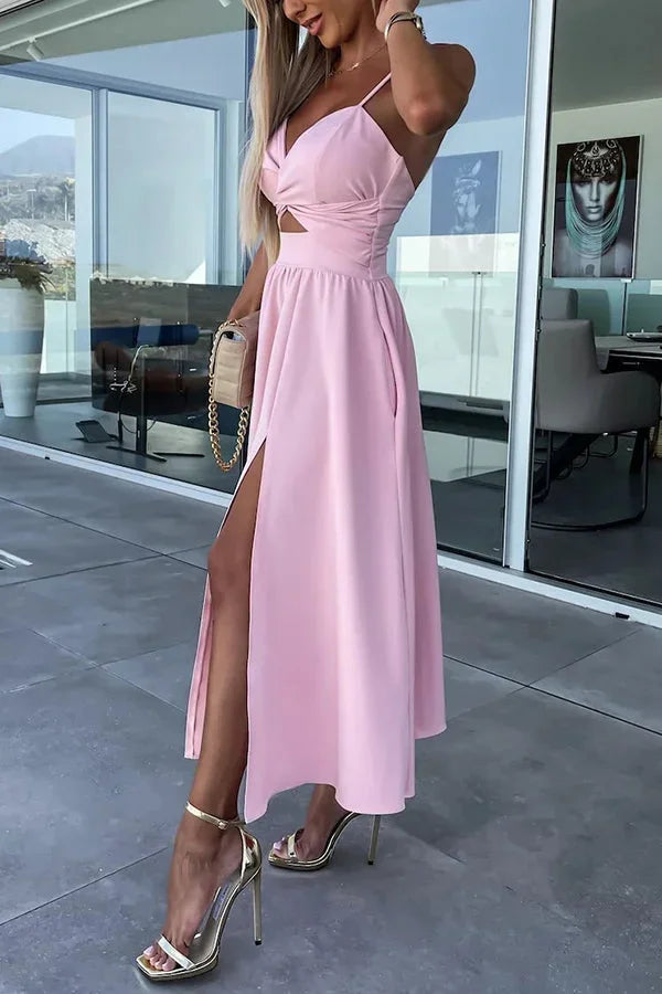 Robe midi décontractée à découpes, en coton léger, avec poches latérales et fente longue pour un style décontracté.