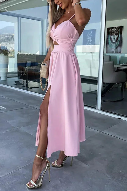 Robe midi décontractée à découpes, en coton léger, avec poches latérales et fente longue pour un style décontracté.