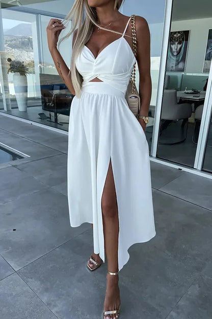 Robe midi décontractée en coton avec découpes, poches pratiques et longue fente latérale pour un style décontracté.