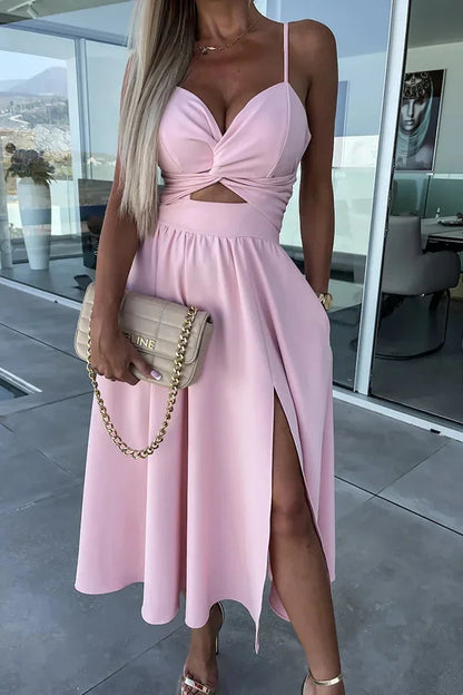 Robe midi décontractée en tissu léger, à découpes, avec poches pratiques et fente longue pour un style décontracté.