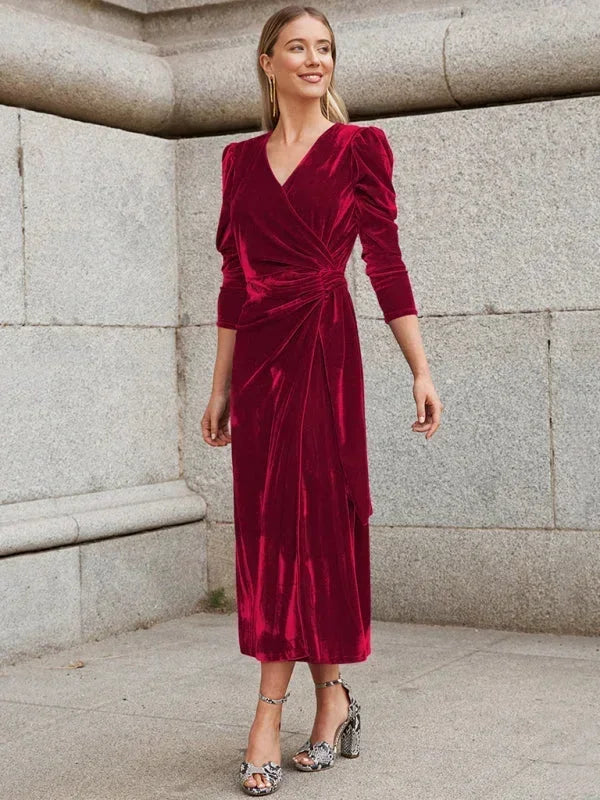 Robe midi femme en tissu fluide, cache-cœur avec manches bouffantes et nœuds décoratifs sur les côtés.