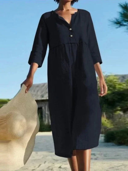Robe midi femme en coton, col en V, poches pratiques, manches 3/4, parfaite pour un style décontracté et élégant.