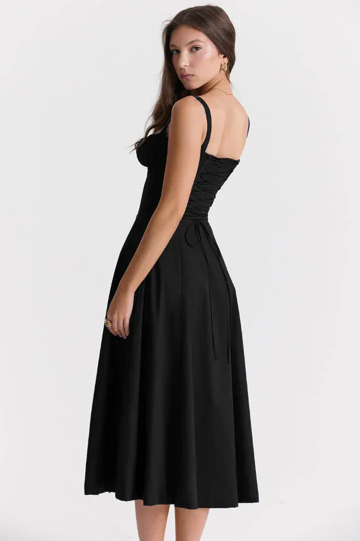 Robe midi femme avec corsage froncé, en tissu léger, manches courtes et motif floral. Idéale pour les journées ensoleillées.