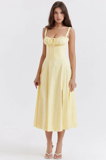 Robe midi jaune femme avec corsage froncé, en tissu léger, idéale pour les sorties printanières et estivales.