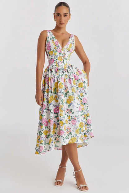 Robe midi pour femme sans manches, en coton léger, motif floral coloré, idéale pour les journées ensoleillées.