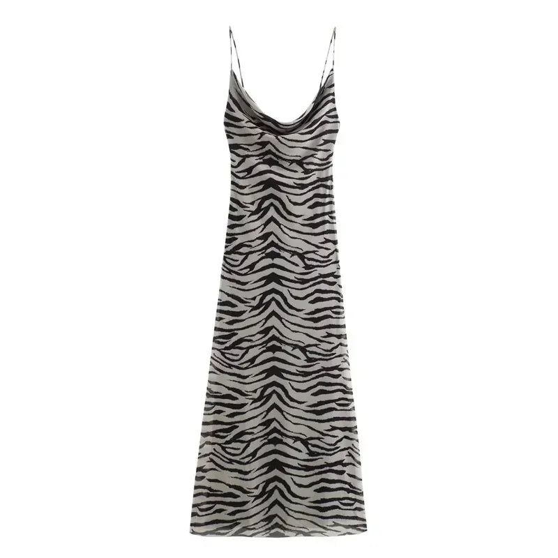 Robe midi femme à motifs animaliers, en tissu léger, avec bretelles fines et coupe fluide, coloris noir.