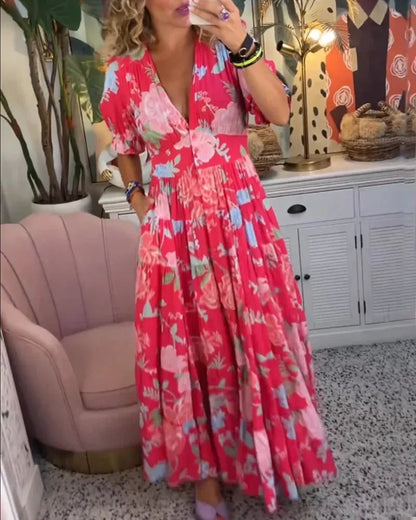 Robe midi femme à motifs floraux, en coton léger, avec manches courtes et taille cintrée pour un look féminin et décontracté.