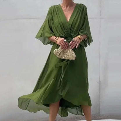 Robe midi femme portefeuille en tissu léger, col V, nouage à la taille pour un ajustement flatteur et un style décontracté.