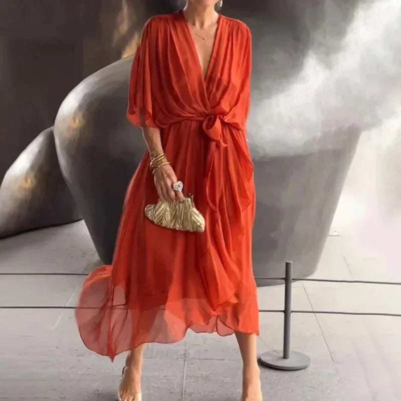 Robe midi femme portefeuille col V en rouge orange, tissu léger, nouage à la taille pour un ajustement flatteur et élégant.