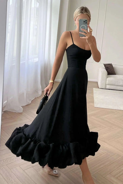 Robe midi femme en coton léger, sans manches, avec volants élégants et coupe fluide, idéale pour les journées d'été.