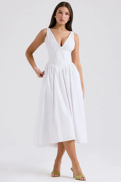 Robe midi florale évasée avec corset, col en V, en tissu léger, idéale pour l'été, disponible en plusieurs couleurs.