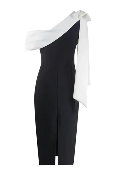 Robe midi noire et blanche avec design asymétrique, une épaule, nœud, en tissu léger et fluide pour un confort optimal.