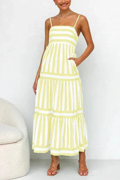 Robe midi à volants, rayée, en tissu fluide, avec bretelles fines, idéale pour un été décontracté.