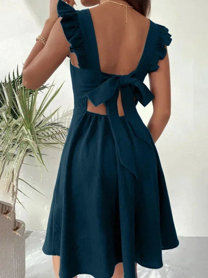 Robe courte évasée à volants, bretelles estivales, en coton léger, disponible en plusieurs couleurs.