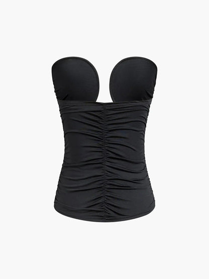Top femme noir bustier en coton avec décolleté en cœur et bretelles ajustables, idéal pour un look élégant et féminin.