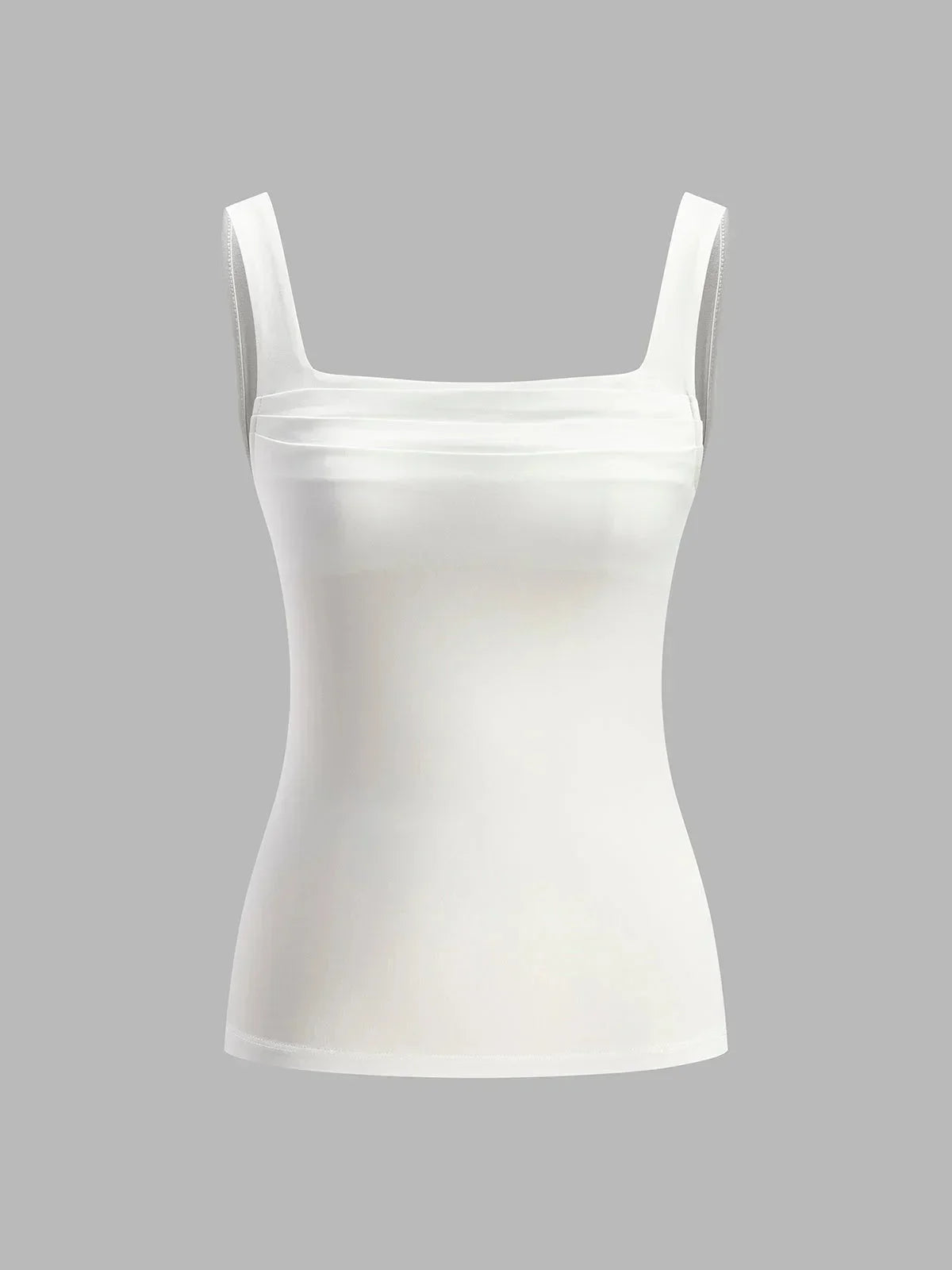 Top femme sans manches en coton léger, avec un fronçage au niveau de la taille pour une silhouette flatter.
