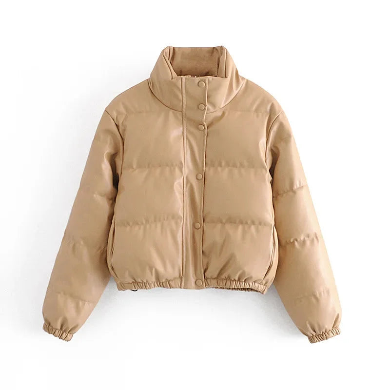 Doudoune d'hiver femme kaki avec capuche, fermeture à glissière et poignets élastiques en tissu léger.