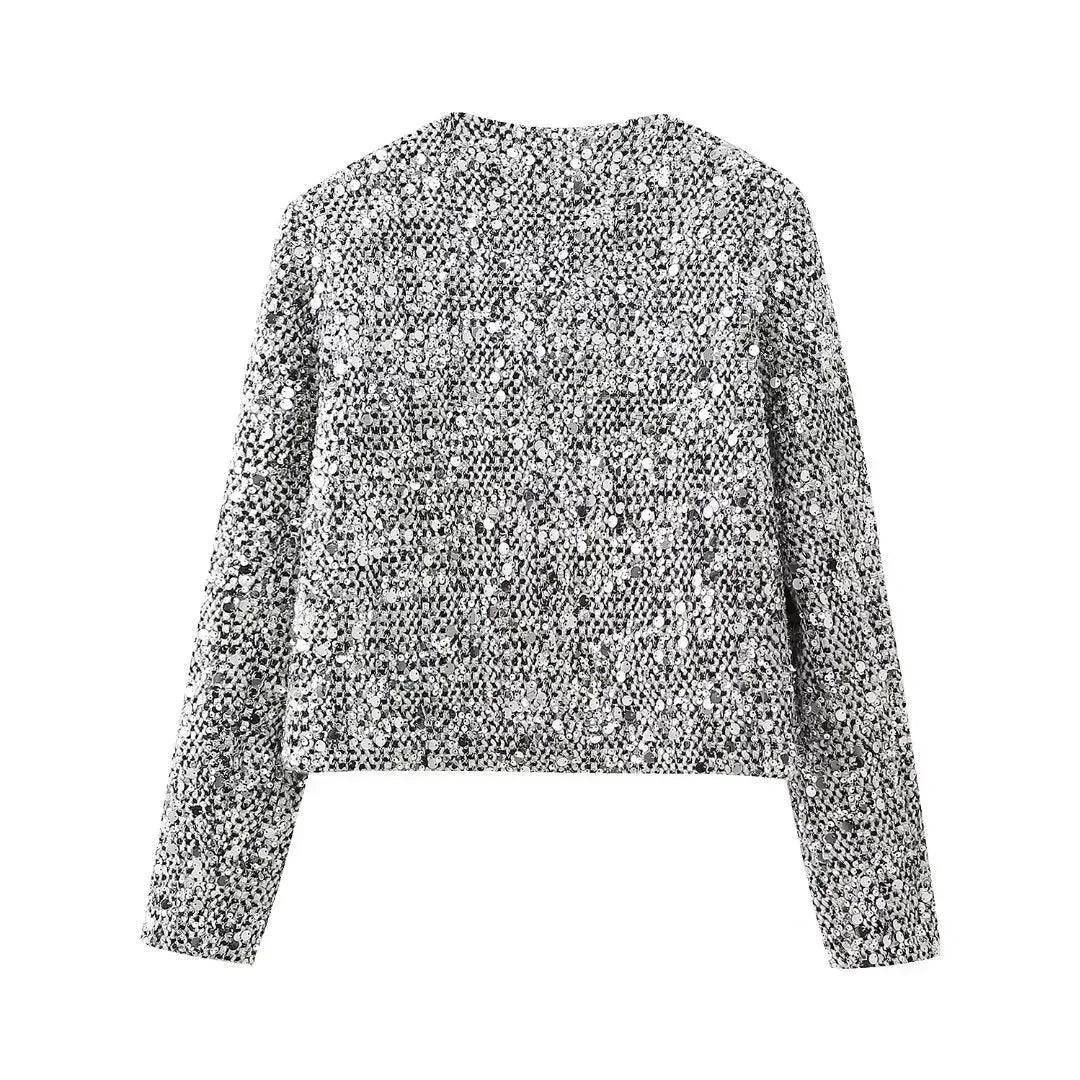 Veste bomber femme en tissu léger, avec sequins argentés, coupe décontractée et poches pratiques.