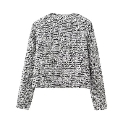 Veste bomber femme en tissu léger, avec sequins argentés, coupe décontractée et poches pratiques.